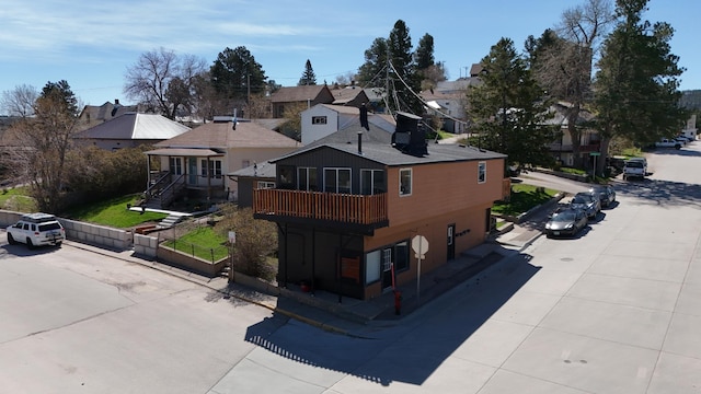 101 E Summit St, Lead, SD 57754 - back of property with a residential view and a wooden deck