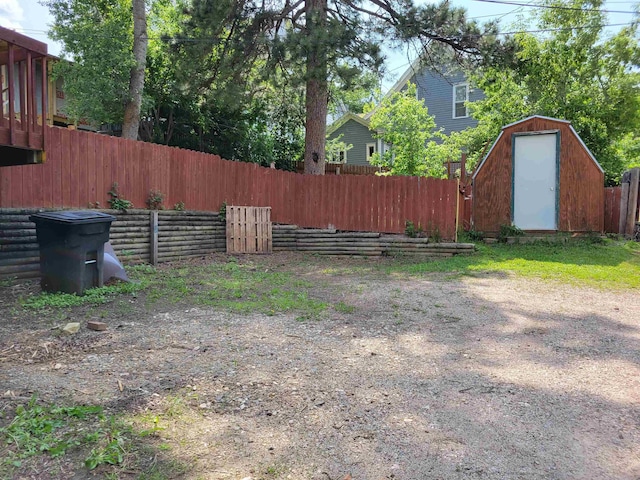 125 S Galena St, Lead, SD 57754 - fenced backyard featuring a shed and an outbuilding