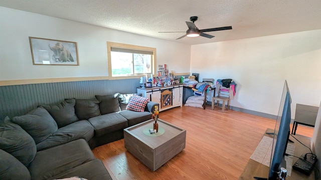 125 S Galena St, Lead, SD 57754 - living room with a textured ceiling, a ceiling fan, and light wood finished floors