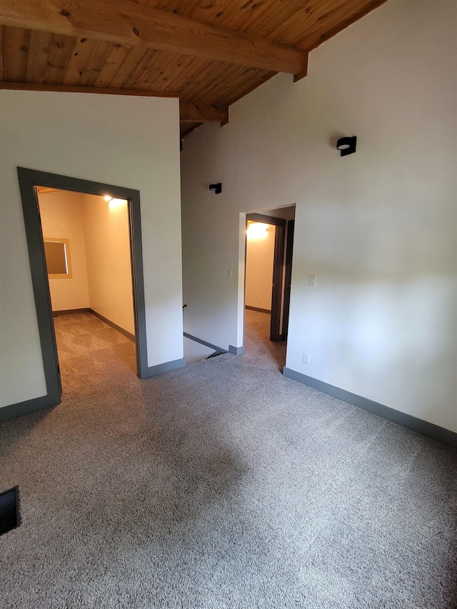 125 S Galena St, Lead, SD 57754 - carpeted empty room with wood ceiling and baseboards