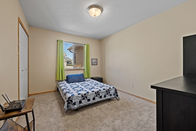 4103 Waterville Ct, Rapid City, SD 57702 - carpeted bedroom featuring baseboards and a closet