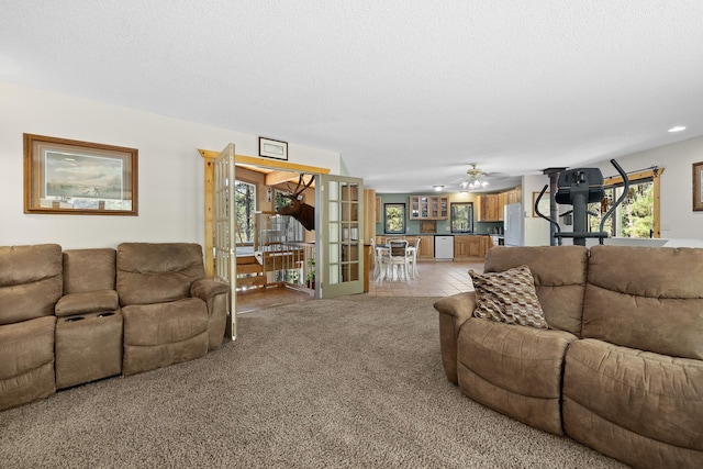 12990 Old Hill City Rd, Keystone, SD 57751 - living area with light colored carpet, ceiling fan, and recessed lighting