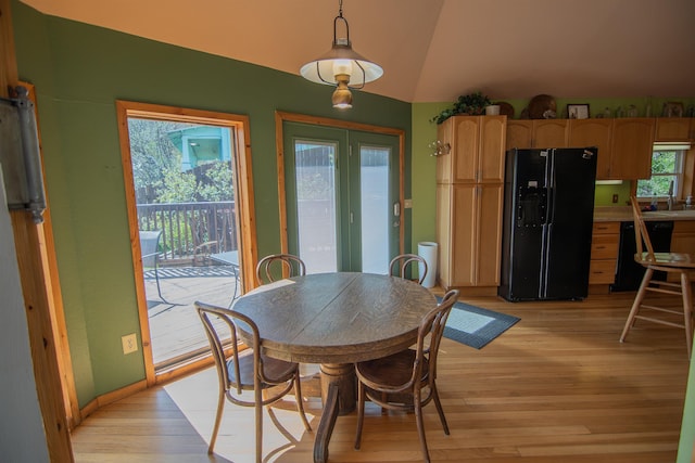10 Centennial Ave, Deadwood, SD 57732 - dining room featuring light wood-style floors and vaulted ceiling