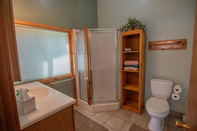 10 Centennial Ave, Deadwood, SD 57732 - bathroom featuring a shower stall, toilet, tile patterned flooring, and vanity