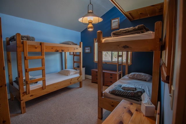 10 Centennial Ave, Deadwood, SD 57732 - carpeted bedroom featuring lofted ceiling