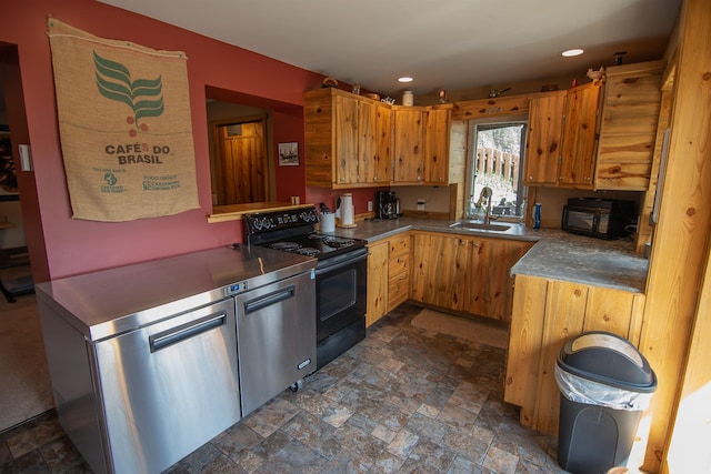 10 Centennial Ave, Deadwood, SD 57732 - kitchen featuring black appliances, a sink, stone finish floors, and recessed lighting