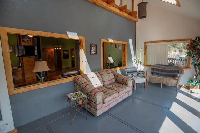 10 Centennial Ave, Deadwood, SD 57732 - living room featuring high vaulted ceiling and concrete floors