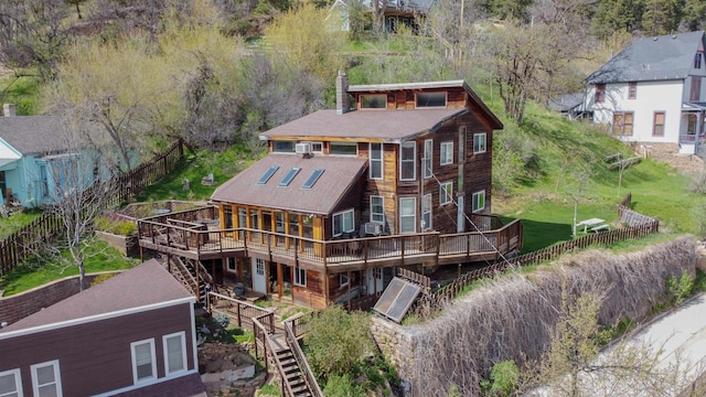 10 Centennial Ave, Deadwood, SD 57732 - rear view of property featuring stairway, a wooden deck, a chimney, and roof with shingles
