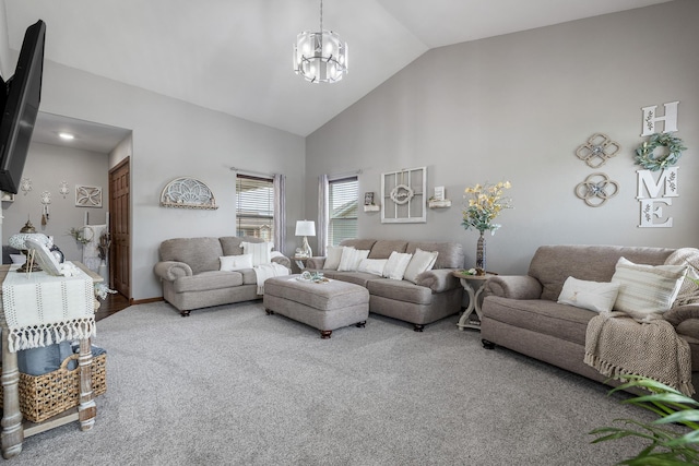4127 Quiment Ct, Rapid City, SD 57702 - living area featuring high vaulted ceiling, carpet flooring, a chandelier, and baseboards
