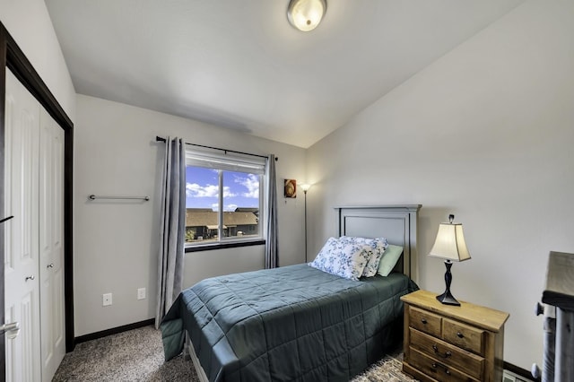 1234 Juneau Dr, Box Elder, SD 57719 - bedroom featuring vaulted ceiling, baseboards, and carpet flooring
