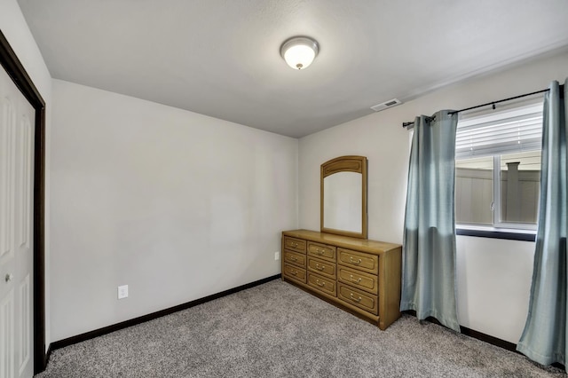 1234 Juneau Dr, Box Elder, SD 57719 - unfurnished bedroom with light colored carpet and baseboards