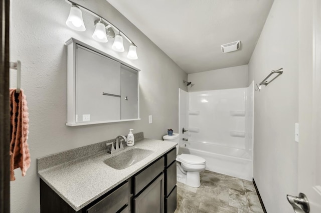 1234 Juneau Dr, Box Elder, SD 57719 - full bath featuring toilet, vanity, shower / bathtub combination, and stone finish floors