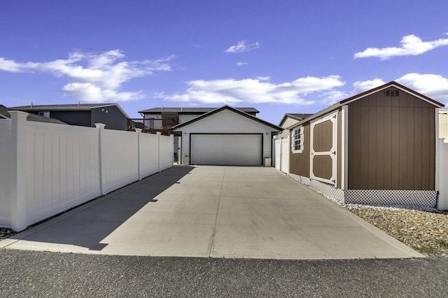1234 Juneau Dr, Box Elder, SD 57719 - view of front facade with fence and an outdoor structure