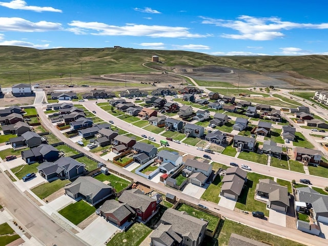 1234 Juneau Dr, Box Elder, SD 57719 - aerial overview of property's location with nearby suburban area and a mountainous background