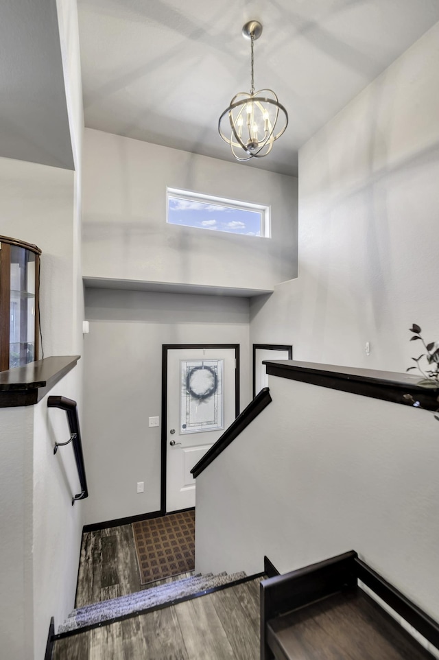 1234 Juneau Dr, Box Elder, SD 57719 - foyer with a chandelier and wood finished floors