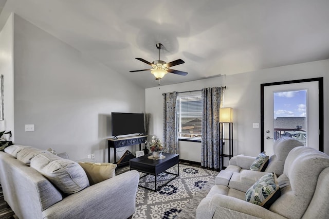 1234 Juneau Dr, Box Elder, SD 57719 - living area featuring a ceiling fan, vaulted ceiling, and baseboards