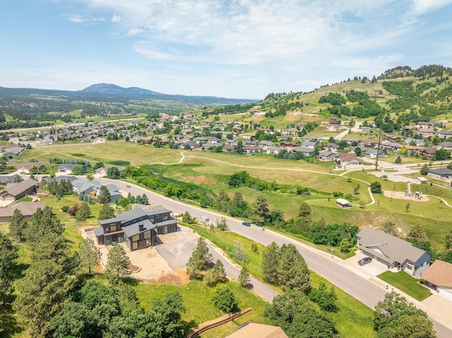 aerial perspective of suburban area featuring mountains