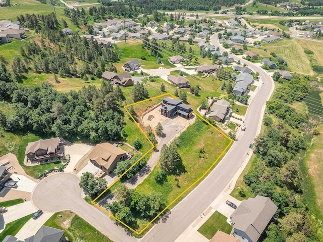 aerial perspective of suburban area with property parcel outlined