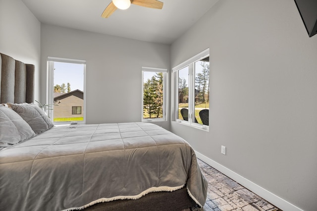 21271 Ridgewood Trl, Lead, SD 57754 - bedroom with baseboards and a ceiling fan