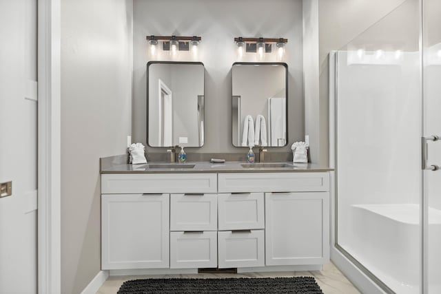 21271 Ridgewood Trl, Lead, SD 57754 - bathroom featuring a shower stall, double vanity, and marble finish floors