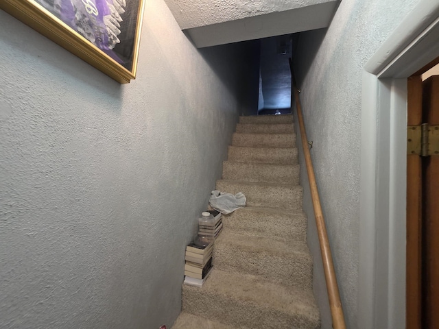 142 W Summit St, Lead, SD 57754 - stairway with a textured wall and a textured ceiling
