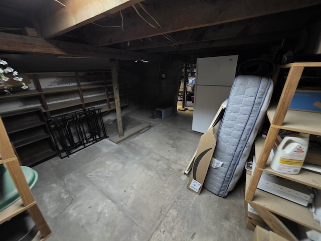 142 W Summit St, Lead, SD 57754 - unfinished basement featuring freestanding refrigerator