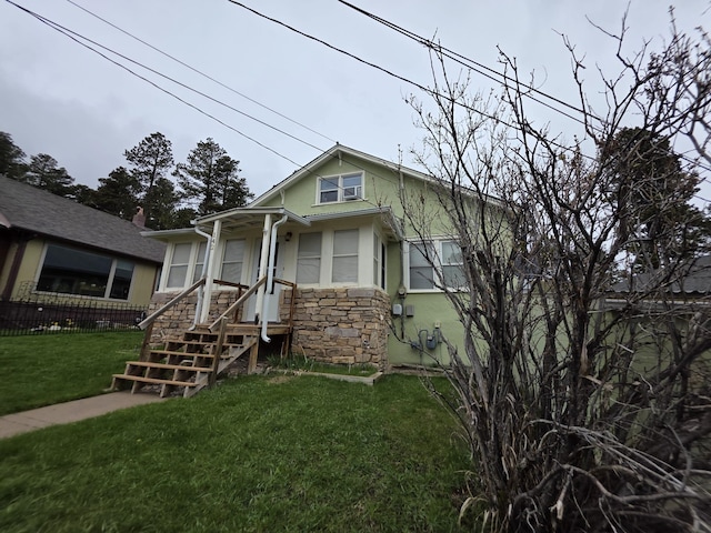 142 W Summit St, Lead, SD 57754 - bungalow-style house with stone siding and stucco siding