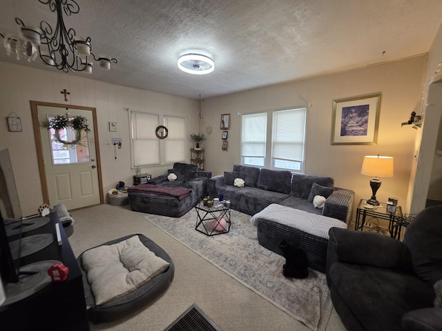 142 W Summit St, Lead, SD 57754 - carpeted living area featuring a chandelier and a textured ceiling