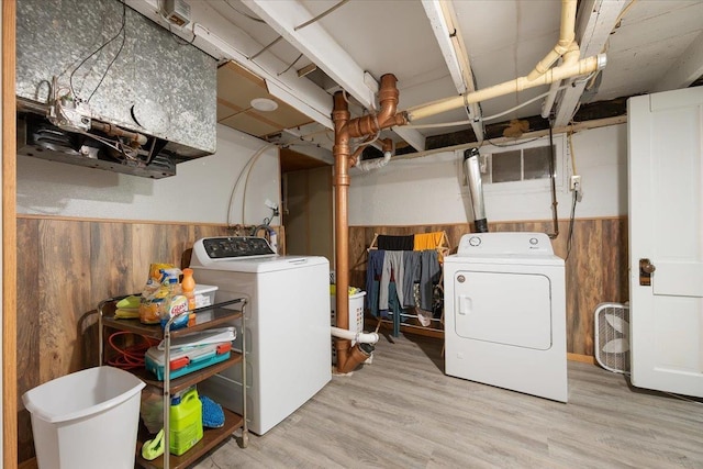 24 Mckinley St, Deadwood, SD 57732 - washroom featuring independent washer and dryer, wood walls, wainscoting, and wood finished floors