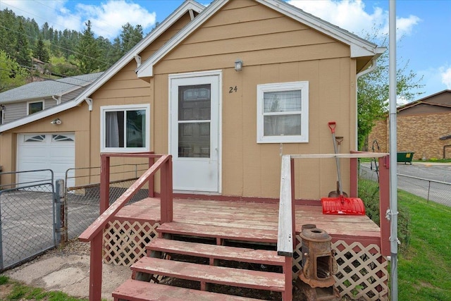 24 Mckinley St, Deadwood, SD 57732 - back of property with fence and a deck