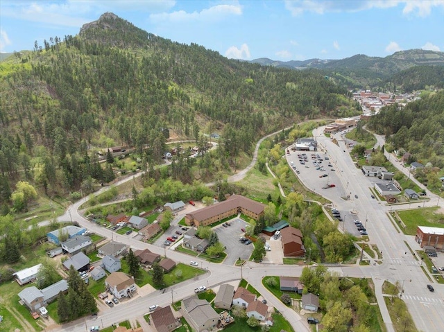 24 Mckinley St, Deadwood, SD 57732 - view of property location with mountains and a heavily wooded area