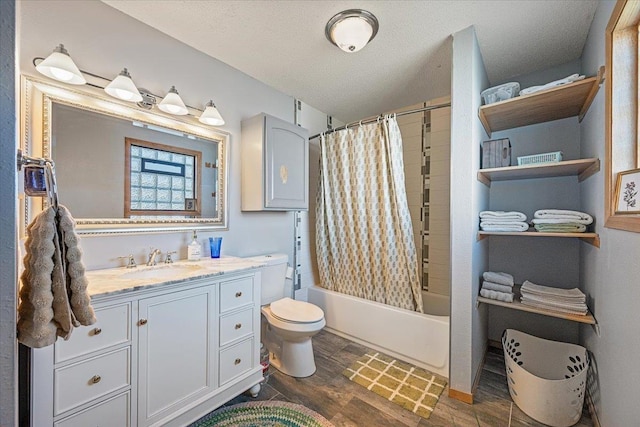 full bath featuring toilet, vanity, shower / tub combo with curtain, wood finished floors, and a textured ceiling