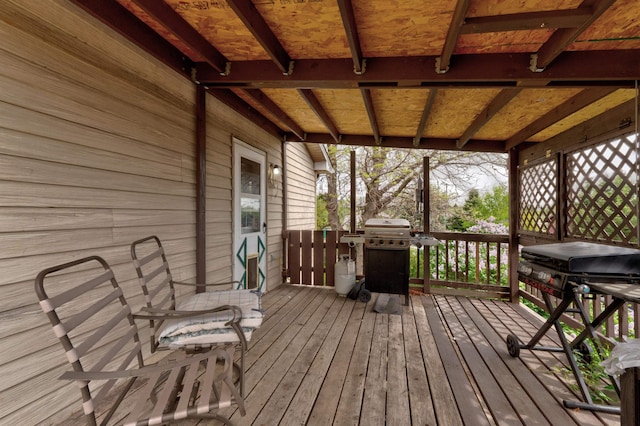 12944 Larene Dr, Black Hawk, SD 57718 - wooden deck with a grill