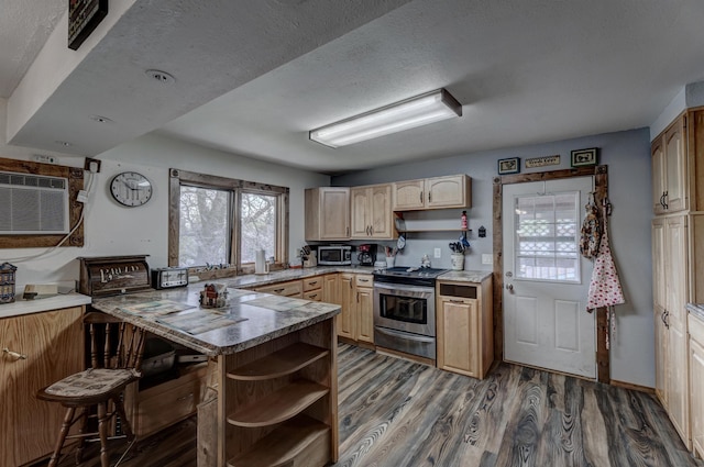 12944 Larene Dr, Black Hawk, SD 57718 - kitchen with stainless steel appliances, light brown cabinetry, a peninsula, wood finished floors, and open shelves