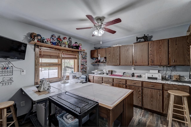 12944 Larene Dr, Black Hawk, SD 57718 - kitchen featuring a ceiling fan, light countertops, and dark wood-type flooring