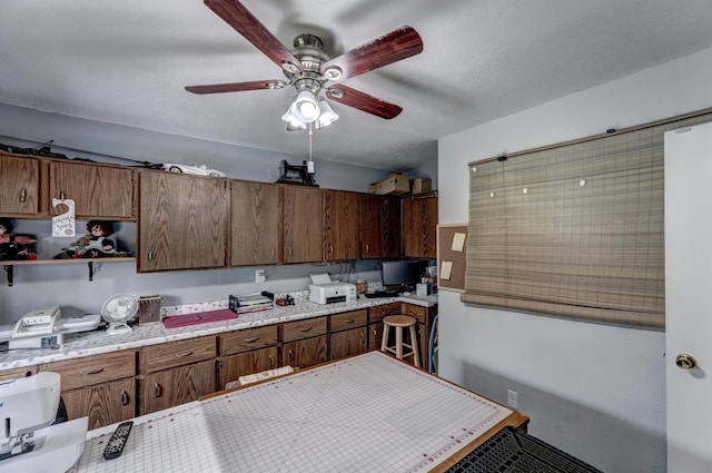 12944 Larene Dr, Black Hawk, SD 57718 - kitchen with light countertops, a ceiling fan, and open shelves