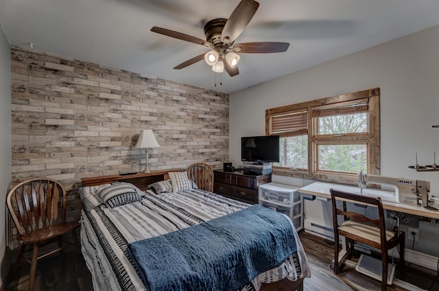 12944 Larene Dr, Black Hawk, SD 57718 - bedroom with brick wall, wood finished floors, and ceiling fan
