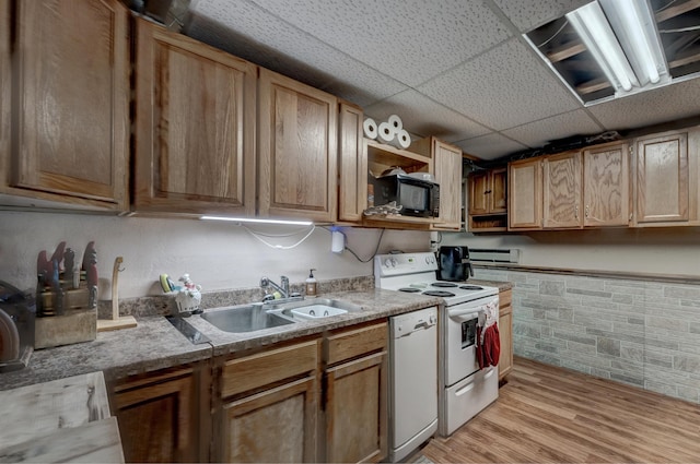 12944 Larene Dr, Black Hawk, SD 57718 - kitchen featuring white appliances, a sink, a paneled ceiling, light wood-type flooring, and light countertops