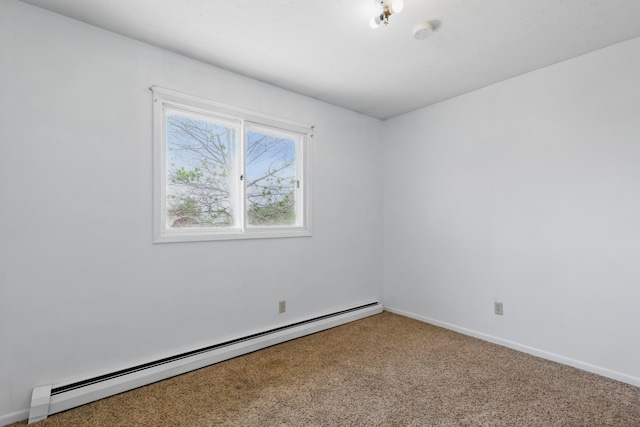 5753 Pluto St, Rapid City, SD 57703 - empty room featuring a baseboard radiator, carpet, baseboards, and a smoke detector
