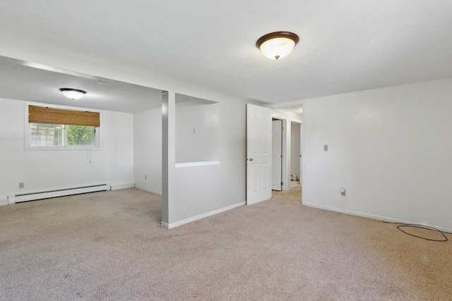 5753 Pluto St, Rapid City, SD 57703 - basement with a baseboard radiator, carpet flooring, and baseboards