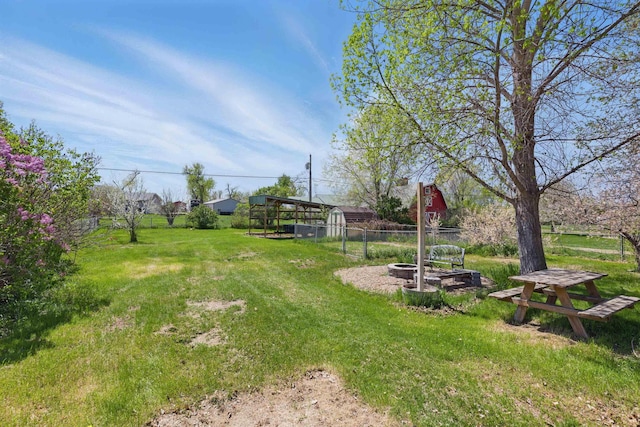 5753 Pluto St, Rapid City, SD 57703 - view of green lawn with an outdoor structure