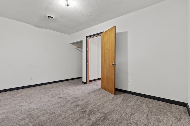 4648 Other, Rapid City, SD 57703 - carpeted spare room with a textured ceiling and baseboards