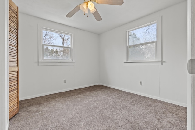 4648 Other, Rapid City, SD 57703 - unfurnished bedroom featuring carpet flooring, a closet, baseboards, and a ceiling fan