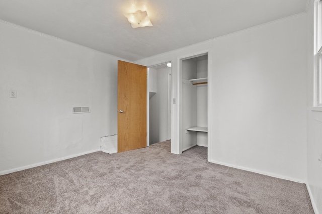 4648 Other, Rapid City, SD 57703 - unfurnished bedroom featuring carpet floors, ornamental molding, a closet, and baseboards