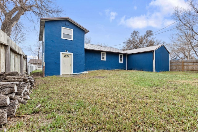 4648 Other, Rapid City, SD 57703 - rear view of house with metal roof and stucco siding