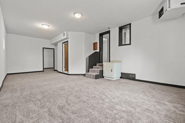 4648 Other, Rapid City, SD 57703 - unfurnished living room with carpet, baseboards, and stairs