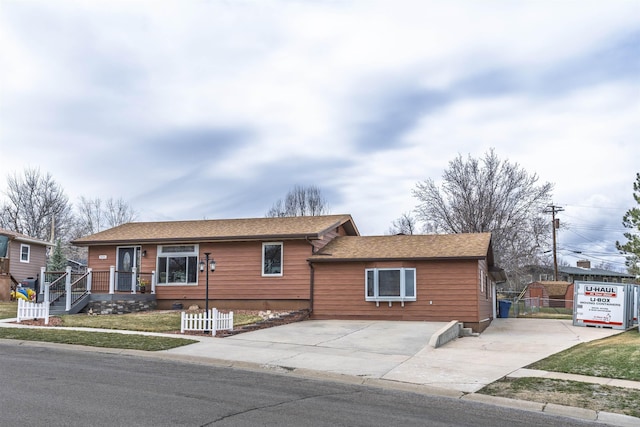 2030 12th Ave, Belle Fourche, SD 57717 - single story home with driveway and fence