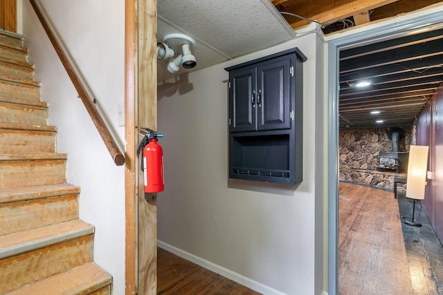 2030 12th Ave, Belle Fourche, SD 57717 - stairway with wood finished floors and baseboards