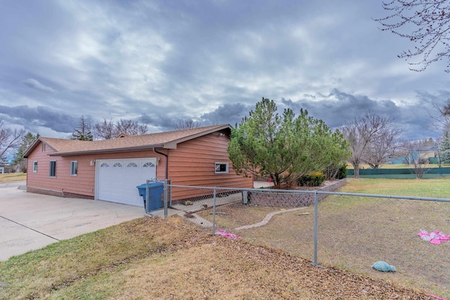 2030 12th Ave, Belle Fourche, SD 57717 - view of home's exterior featuring fence and concrete driveway