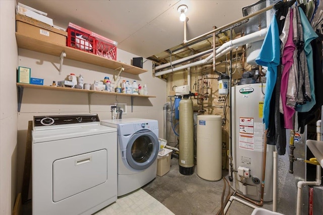 1129 Foothills Rd, Sturgis, SD 57785 - laundry area featuring gas water heater and washing machine and clothes dryer